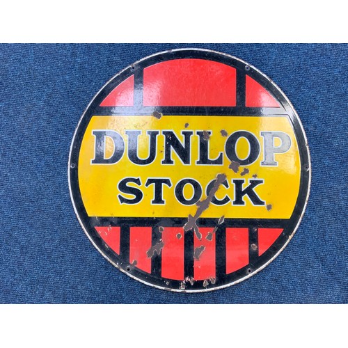 6 - CIRCULAR ENAMEL ADVERTISING SIGN, DUNLOP STOCK, APPROX. 61 CM IN DIAMETER, RED YELLOW & BLACK