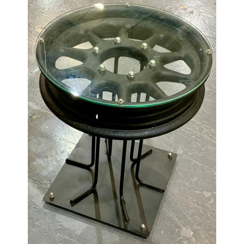 14 - VINTAGE PRE WAR AUSTIN SANKEY WHEEL, CONVERTED TO A GLASS TOPPED TABLE