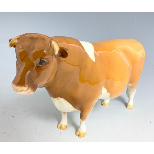 128 - BESWICK MODELS  OF A GUERNSEY BULL & A GUERNSEY COW