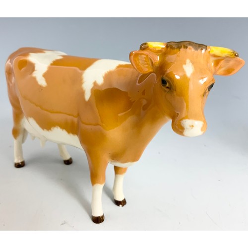 128 - BESWICK MODELS  OF A GUERNSEY BULL & A GUERNSEY COW