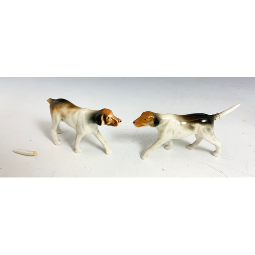 133 - PORCELAIN MODEL OF A HUNTSMAN ON HORSE & 2 FOX HOUNDS