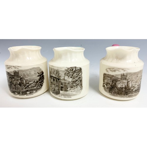 181 - 5 TRANSFER PRINTED JUGS DECORATED  WITH MALVERN SCENES TALLEST  11.5cm