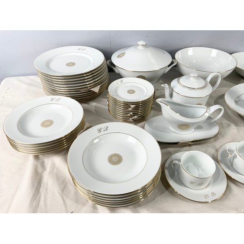 223 - LARGE QUANTITY OF LIMOGES PORCELAIN TABLEWARE WITH GILT DECORATION ON BRILLIANT WHITE PORCELAIN  AND... 