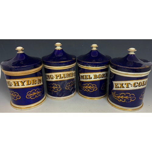 221 - 4 LARGE DRUG / CHEMIST JARS  WITH COVERS COLBALT BLUE WITH GILT  DECORATION 30cm TALL ADVISED FROM M... 