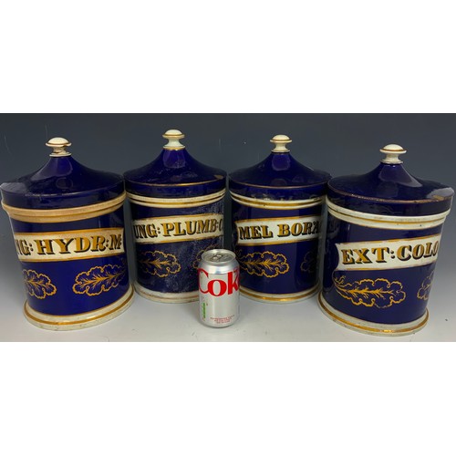 221 - 4 LARGE DRUG / CHEMIST JARS  WITH COVERS COLBALT BLUE WITH GILT  DECORATION 30cm TALL ADVISED FROM M... 