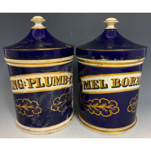 221 - 4 LARGE DRUG / CHEMIST JARS  WITH COVERS COLBALT BLUE WITH GILT  DECORATION 30cm TALL ADVISED FROM M... 