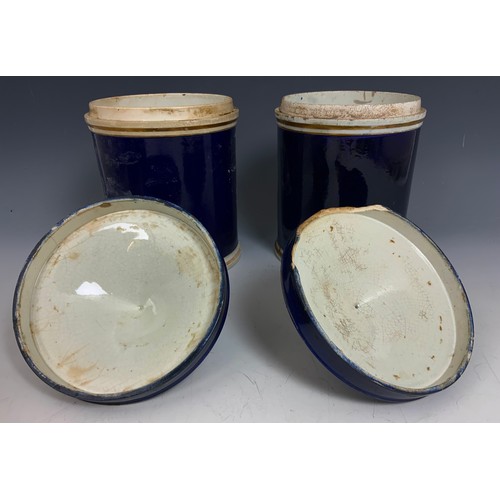 221 - 4 LARGE DRUG / CHEMIST JARS  WITH COVERS COLBALT BLUE WITH GILT  DECORATION 30cm TALL ADVISED FROM M... 