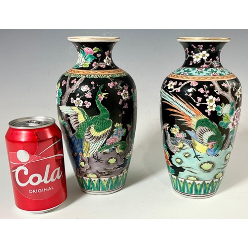 228 - 2 SIMILAR VINTAGE HAND PAINTED ORIENTAL BALUSTER VASES WITH PEACOCKS, FLOWERS AND BLOSSOM