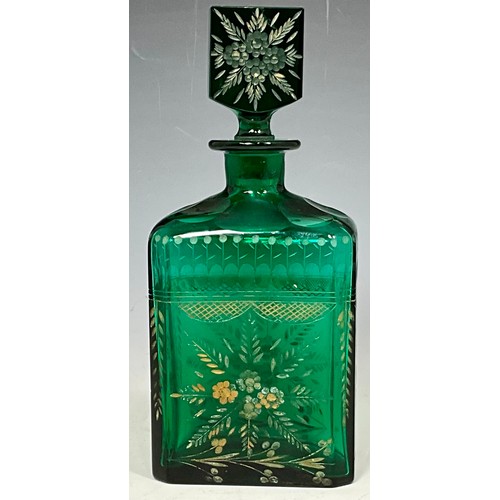 256 - VINTAGE GREEN GLASS DECANTER WITH ENAMEL FLOWER DECORATION A/F