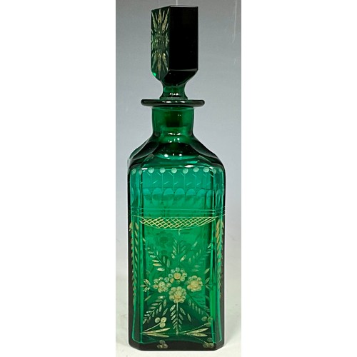 256 - VINTAGE GREEN GLASS DECANTER WITH ENAMEL FLOWER DECORATION A/F