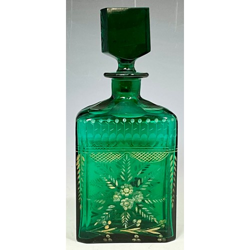 256 - VINTAGE GREEN GLASS DECANTER WITH ENAMEL FLOWER DECORATION A/F