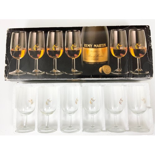 299 - BOXED SET OF GLASSES TOGETHER WITH A REMY MARTIN GAMES BARREL