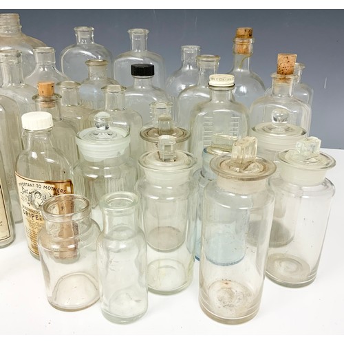 313 - LARGE QUANTITY OF CLEAR GLASS CHEMIST BOTTLES & JARS ADVISED FROM MANDRRS CHEMIST MALVERN