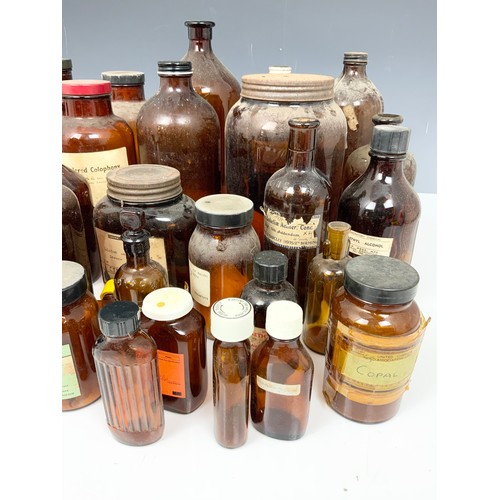 310 - QUANTITY OF BROWN GLASS CHEMIST / APOTHECARY JARS & BOTTLES ADVISED  FROM MANDERS CHEMIST MALVERN