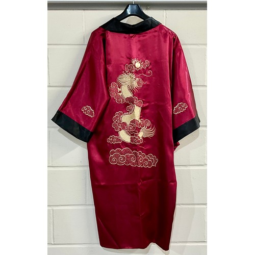 435 - KIMONO, A REVERSABLE BLACK 7 RED KIMONO WITH DRAGON DESIGN