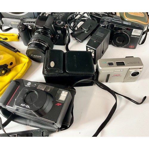 392 - VINTAGE CAMCORDER AND CAMERAS WITH ACCESSORIES INC. SHARP, CANON, OLYMPUS AND MINOLTA