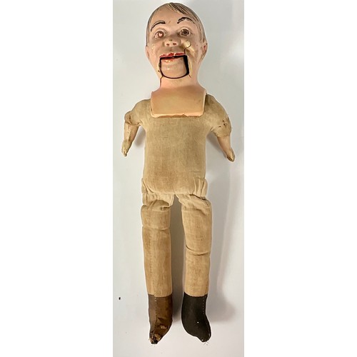 457 - A VINTAGE `RELIABLE` VENTRILOQUIST DUMMY WITH COMPOSITION HEAD AND LOWER ARMS AND STUFFED BODY AND L... 