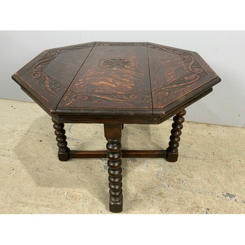 658 - CARVED OAK OCTAGONAL  OCCASIONAL TABLE 80cm LONG