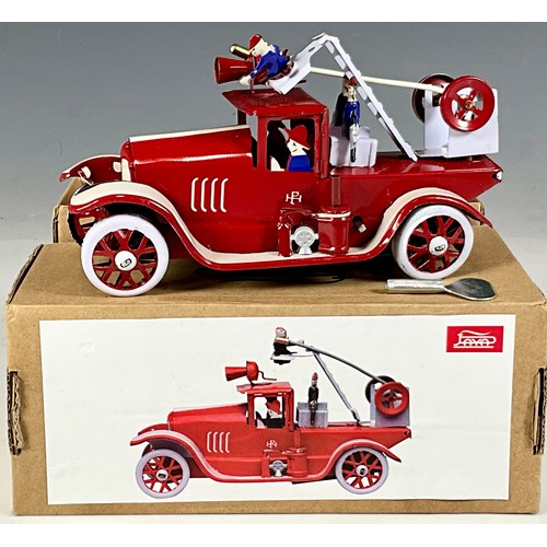 289 - TWO MODERN TIMPLATE MODELS FAYA 1905 FIRE ENGINE BOXED & A TINPLATE MOTORCYCLE & SIDE CAR