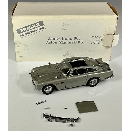 288 - A BOXED DANBURY MINT JAMES BOND 007 ASTON MARTIN DB5. SOME PARTS LOOSE AS SHOWN