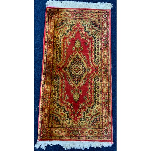 727 - RED GROUND RUG WITH GEOMETRIC PATTERN 147cm x 107cm & A RED GROUND RUNNER 118cm x60cm