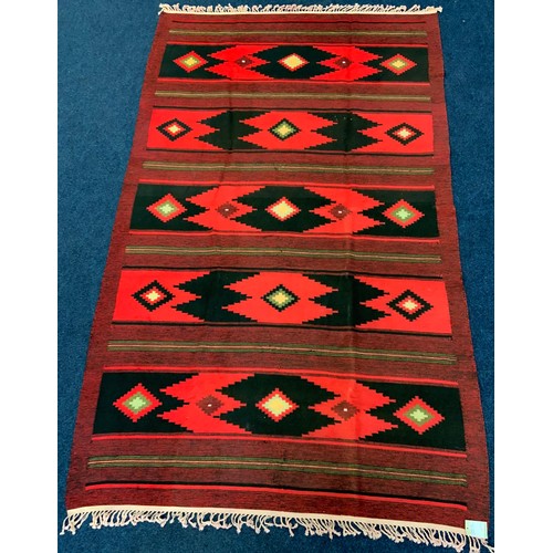 729 - UKRANIAN RED GROUND  KILIM RUG WITH GEOMETRIC PATTERN APPROX 23cm x 145cm