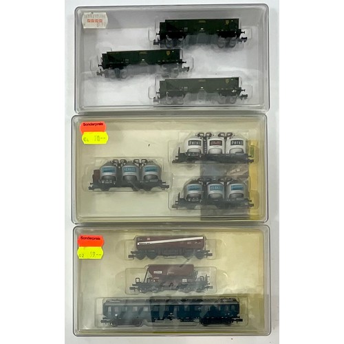 303 - TRIX, N GAUGE RAILWAY MODELS, 3 TRIPLE PACKS, 13419 BOGIE WAGONS, 15190 TRIPLE CEMENT WAGONS, & 1514... 