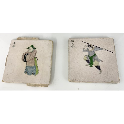 21 - 4 RARE DELFT TILES EACH DEPICTING A CHINESE FIGURE, EACH APPROX. 13 cm square