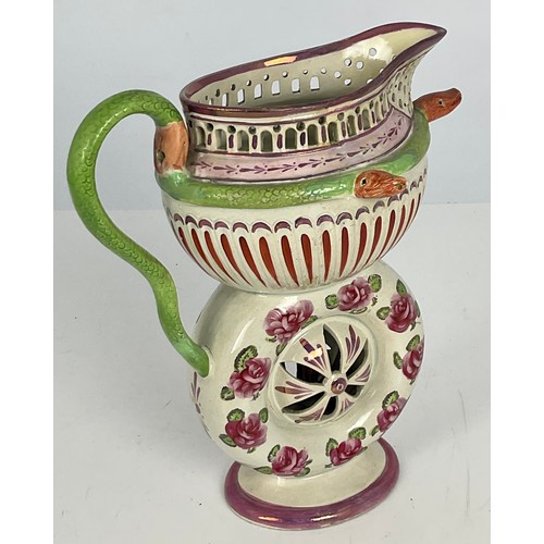 32 - AN UNUSUAL 19TH CENTURY SUNDERLAND LUSTRE PUZZLE JUG WITH SERPENT SPOUTS, APPROX. 21 cm