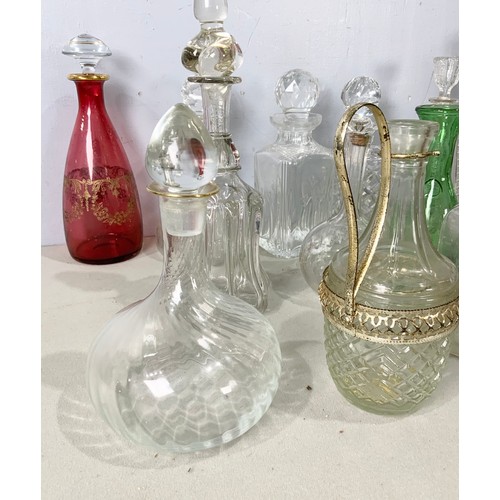 225 - LARGE QUANTITY OF DECANTERS & EWERS