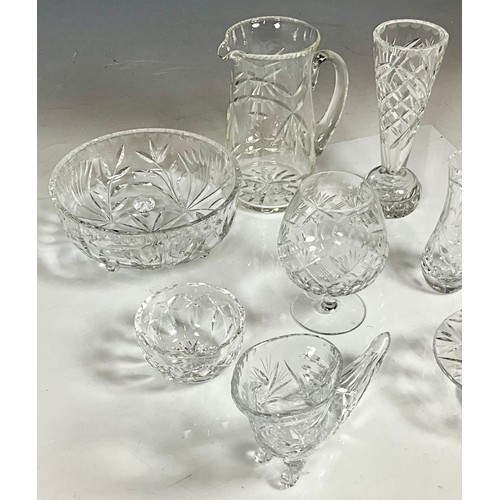 223 - MISC. CUT GLASS  INC. BOWLS, VASES, A LARGE JUG, A LARGE COGNAC GLASS AND A CORNUCOPIA VASE