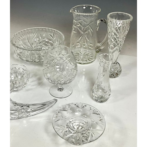 223 - MISC. CUT GLASS  INC. BOWLS, VASES, A LARGE JUG, A LARGE COGNAC GLASS AND A CORNUCOPIA VASE