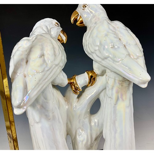 259 - ITALIAN PEARLESCENT WHITE AND GILDED CERAMIC TABLE LAMP DEPICTING A PAIR OF PARROTS ON A BRANCH. APP... 