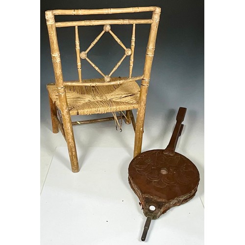 326 - VINTAGE CHILDS BAMBOO CHAIR AND ANTIQUE LONG REACH HAND CARVED BELLOWS