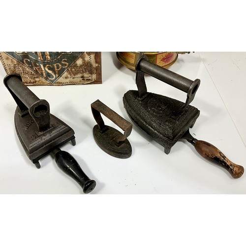 340 - 2 VINTAGE BRASS AND CAST PARAFFIN STOVE BURNERS T/W MISC. CAST FLAT IRONS AND TRIVETS