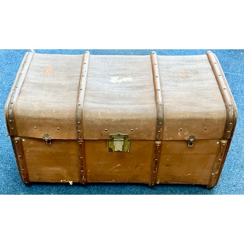 397 - EARLY 20TH CENTURY BROWN CANVAS BOUND STEAMER TRUNK WITH TREEN STRAPWORK. Approx. 90cm x 55cm x 47cm... 