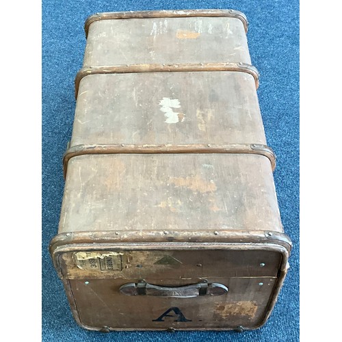 397 - EARLY 20TH CENTURY BROWN CANVAS BOUND STEAMER TRUNK WITH TREEN STRAPWORK. Approx. 90cm x 55cm x 47cm... 