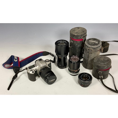 424 - CANON EOS 500 WITH ULTRASONIC ZOOM LENS AND VARIOUS OTHER CANON LENSES, 70-210 MM, 50 MM AND 135 MM