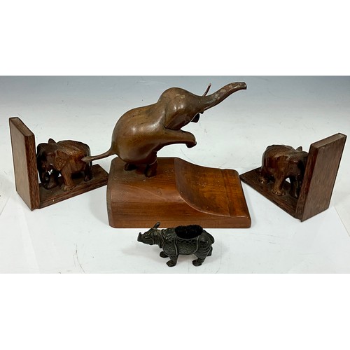 316 - CARVED WOODEN ELEPHANT PAIR OF OAK ELEPHANT BOOKENDS AND A FIGURE OF A RHINOCEROS WITH BRUSH. INCLUD... 