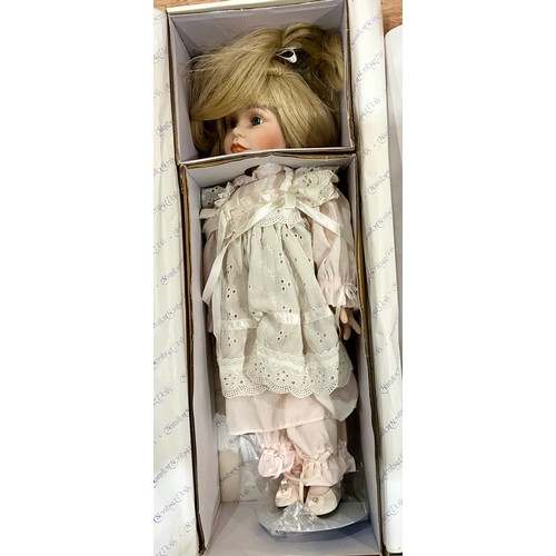 457 - COLLECTION OF (8) BOXED PORCELAIN HEAD DOLLS BY HAMILTON HERITAGE, FRANKLIN, H.SAMUAL AND DANBURY MI... 