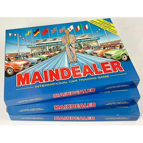 28 - 3 BOXED ‘MAINDEALER’ BOARD GAMES. INTERNATIONAL CAR TRADING GAME. MINT GAMES LTD 1987