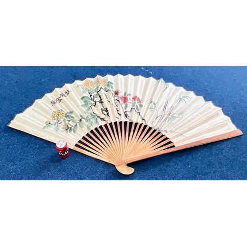 97 - LARGE BAMBOO HAND PAINTED FAN DECORATED WITH FLOWERS AND BAMBOO WITH A CHINESE INSCRIPTION. RADIUS 8... 