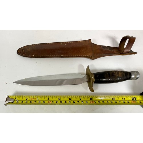 128 - A FIGHTING KNIFE WITH STAINLESS STEEL BLADE MARKED WHITBY, LEATHER SHEATH, BLADE APPROX. 19.5 cm