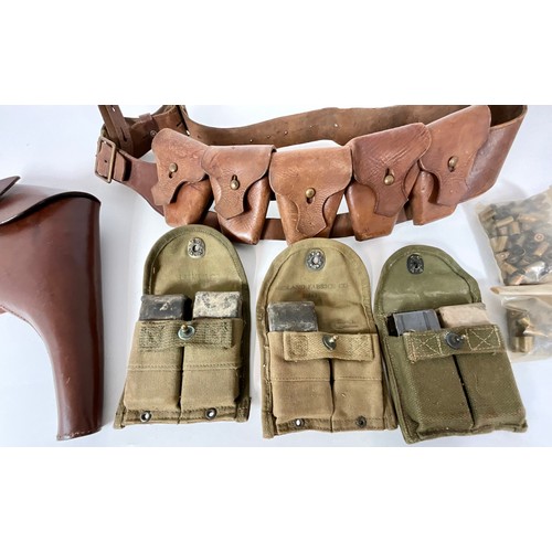 143 - 3 US CANVAS MAGAZINE POUCHES, LEATHER BELT WITH POUCHES, A LEATHER PISTOL HOLSTER AND QTY. SPENT BUL... 