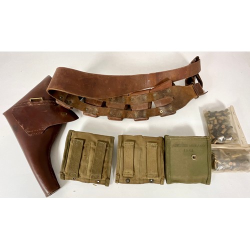 143 - 3 US CANVAS MAGAZINE POUCHES, LEATHER BELT WITH POUCHES, A LEATHER PISTOL HOLSTER AND QTY. SPENT BUL... 