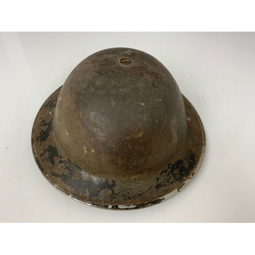 146 - A WW II BRITISH ARMY MK II STEEL HELMET, BLACK LEATHER LINER AND CANVAS STRAP