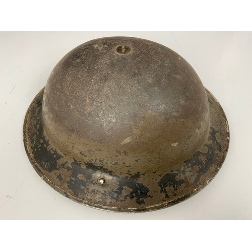 146 - A WW II BRITISH ARMY MK II STEEL HELMET, BLACK LEATHER LINER AND CANVAS STRAP