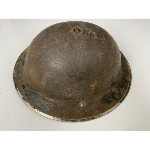 146 - A WW II BRITISH ARMY MK II STEEL HELMET, BLACK LEATHER LINER AND CANVAS STRAP