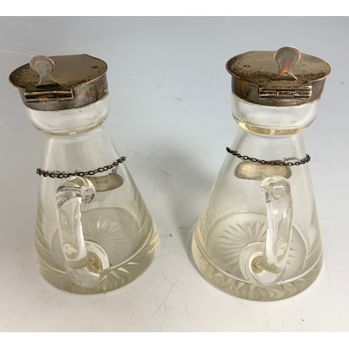 75 - A MATCHING PAIR OF WHISKY NOGGINS EACH WITH A SILVER HINGER COVER AND EACH HAVING A SILVER WHISKY LA... 