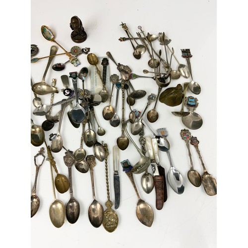 209 - SOUVENIR SPOONS , HALLMARKED SILVER SUGAR TONGS , MIXED SPOONS ETC